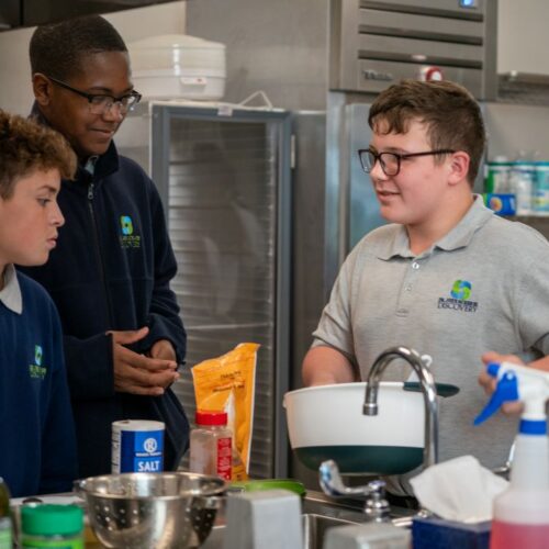 Emeril’s Culinary Garden & Teaching Kitchen students at Dr. John Ochsner Discovery Health Sciences Academy